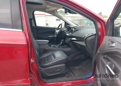 2017 Ford Escape Titanium z USA, uszkodzony, nr VIN 1FMCU9J97HUD48204